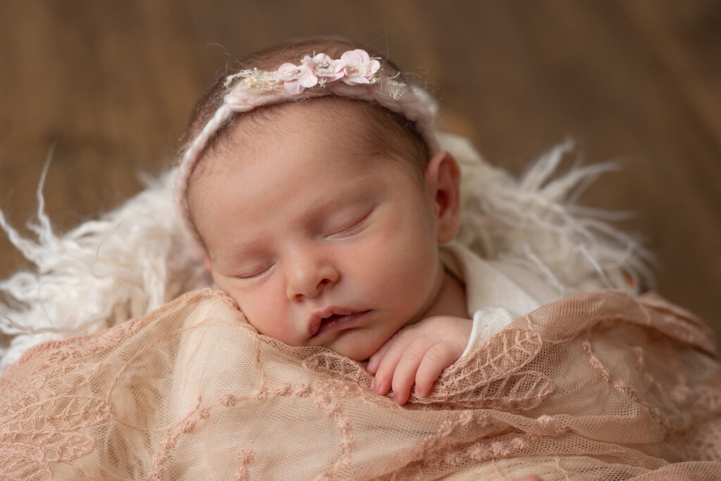 Newborn girl in pink lace at photography studio in Pittsburgh PA | Kelly Adrienne Photography